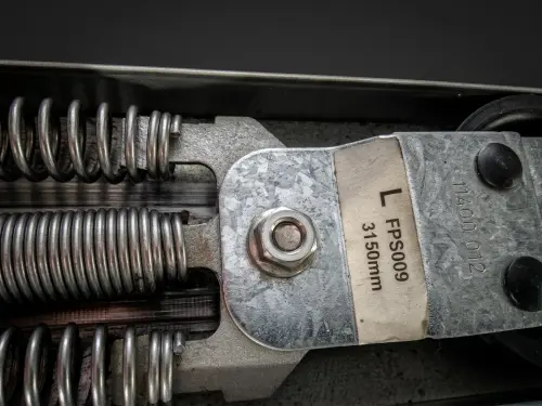Novoferm horizontal tension spring with metal
            roller bracket
