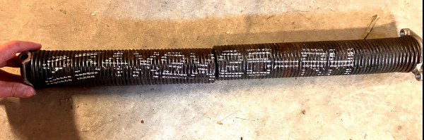 Marking on a garage door spring